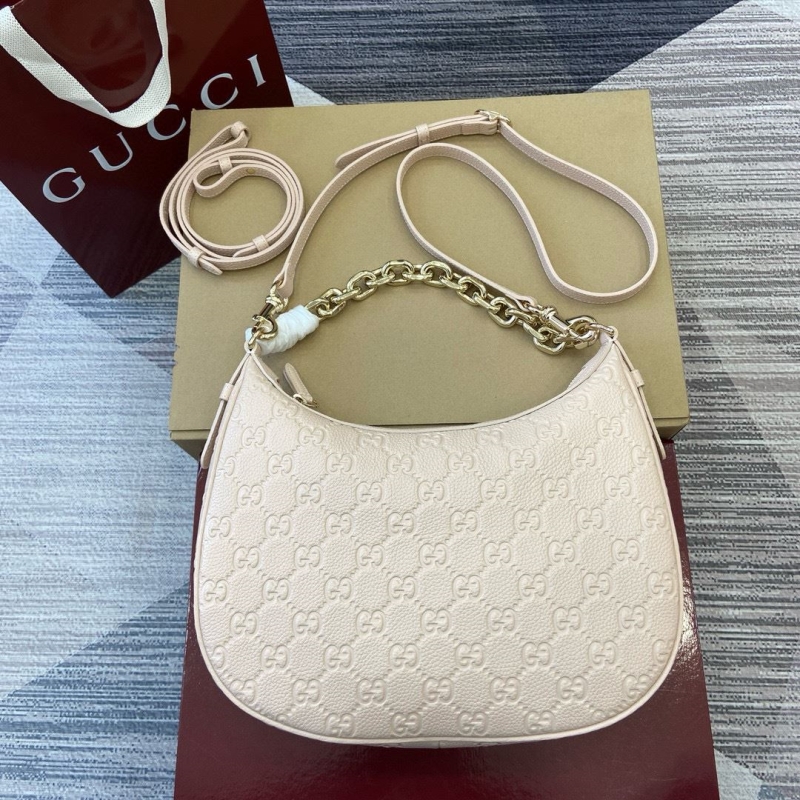 G*u*i top handle bags